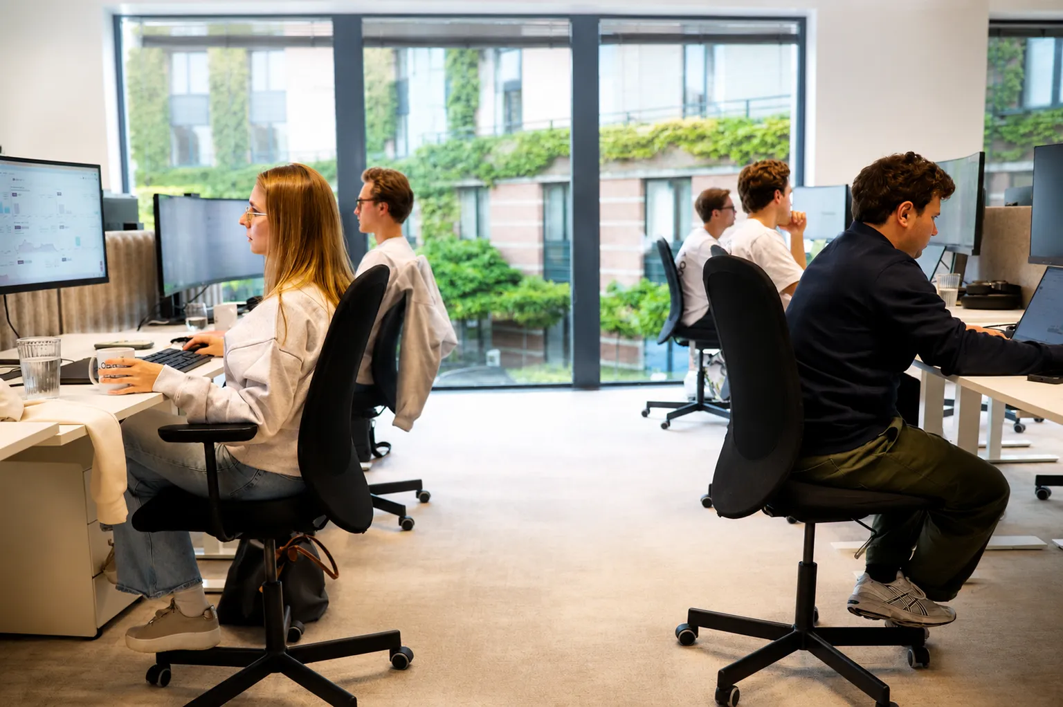 Het OBS-team aan het werk op kantoor in Antwerpen — Belgisch Odoo Gold Partner
